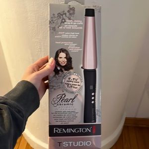 Remington 1 inch to 1.5 inch ceramic curling wand. Never been used or opened!